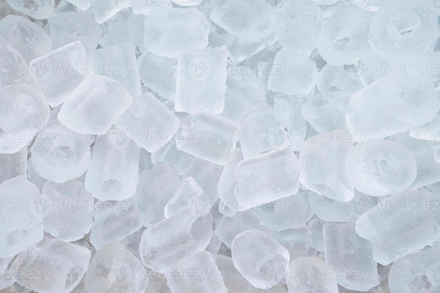 Heap of Ice cubes in bucket photo