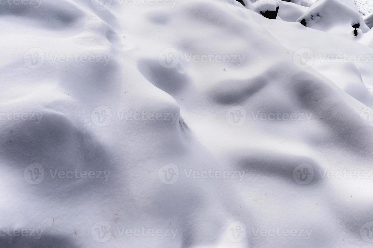 White snow covered on slope hill in winter photo