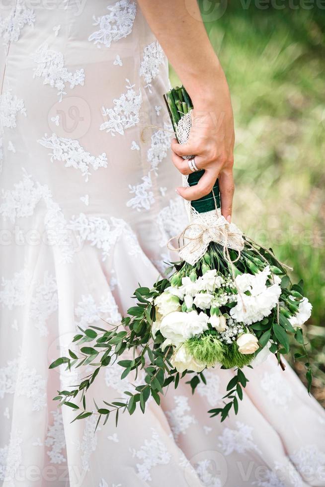 elegant wedding bouquet of fresh natural flowers photo