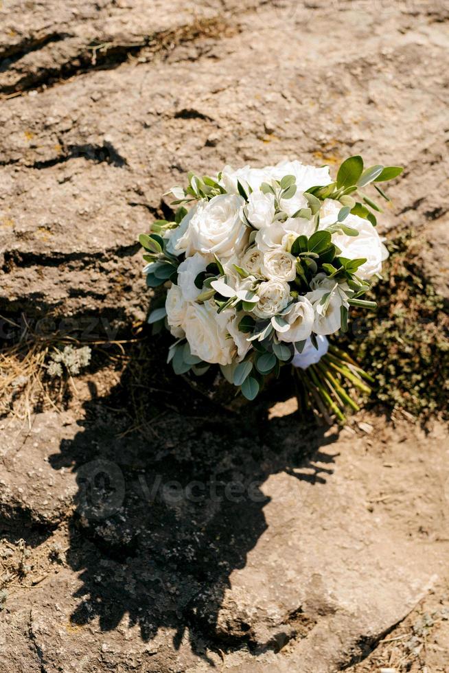 elegant wedding bouquet of fresh natural flowers photo