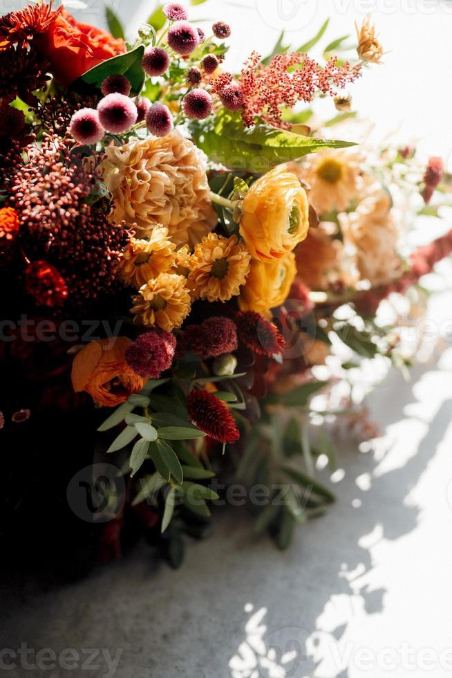 red elegant wedding bouquet of fresh natural flowers photo