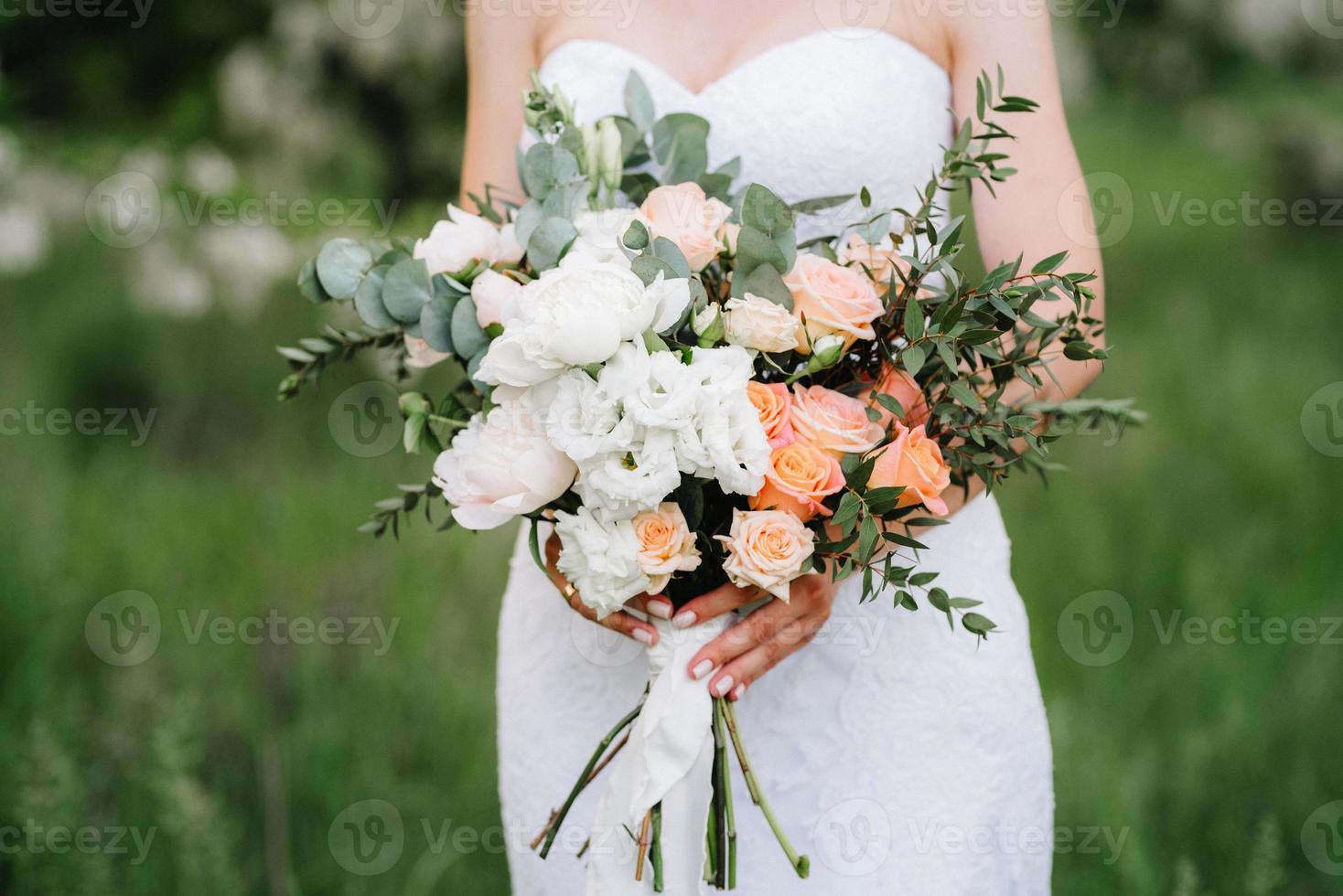 elegant wedding bouquet of fresh natural flowers photo