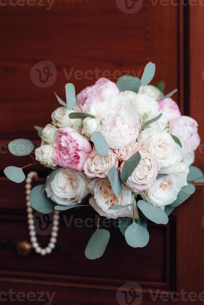 elegant wedding bouquet of fresh natural flowers photo