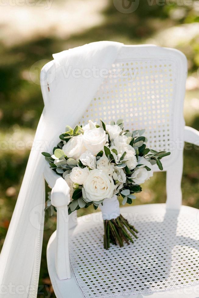 elegant wedding bouquet of fresh natural flowers photo