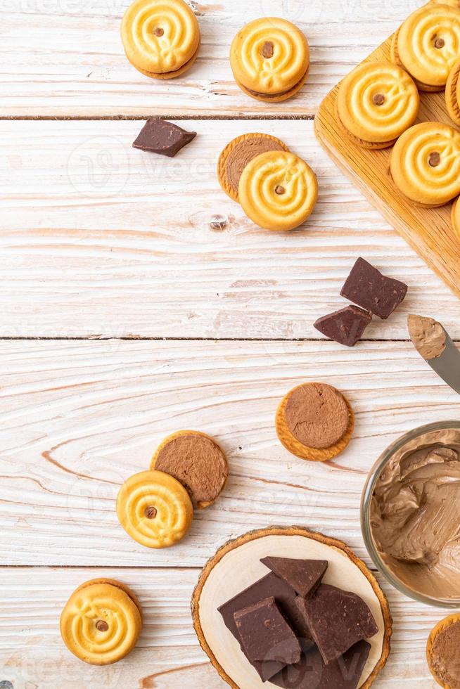 Sandwich cookies with chocolate cream photo