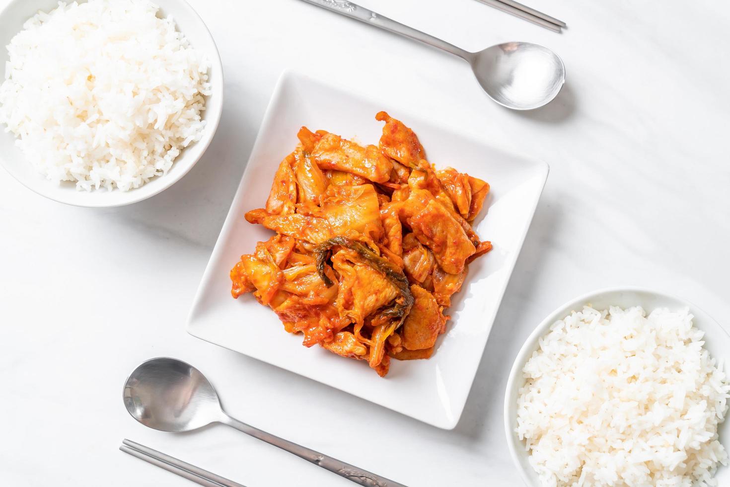 Stir-fried pork with kimchi - Korean food style photo