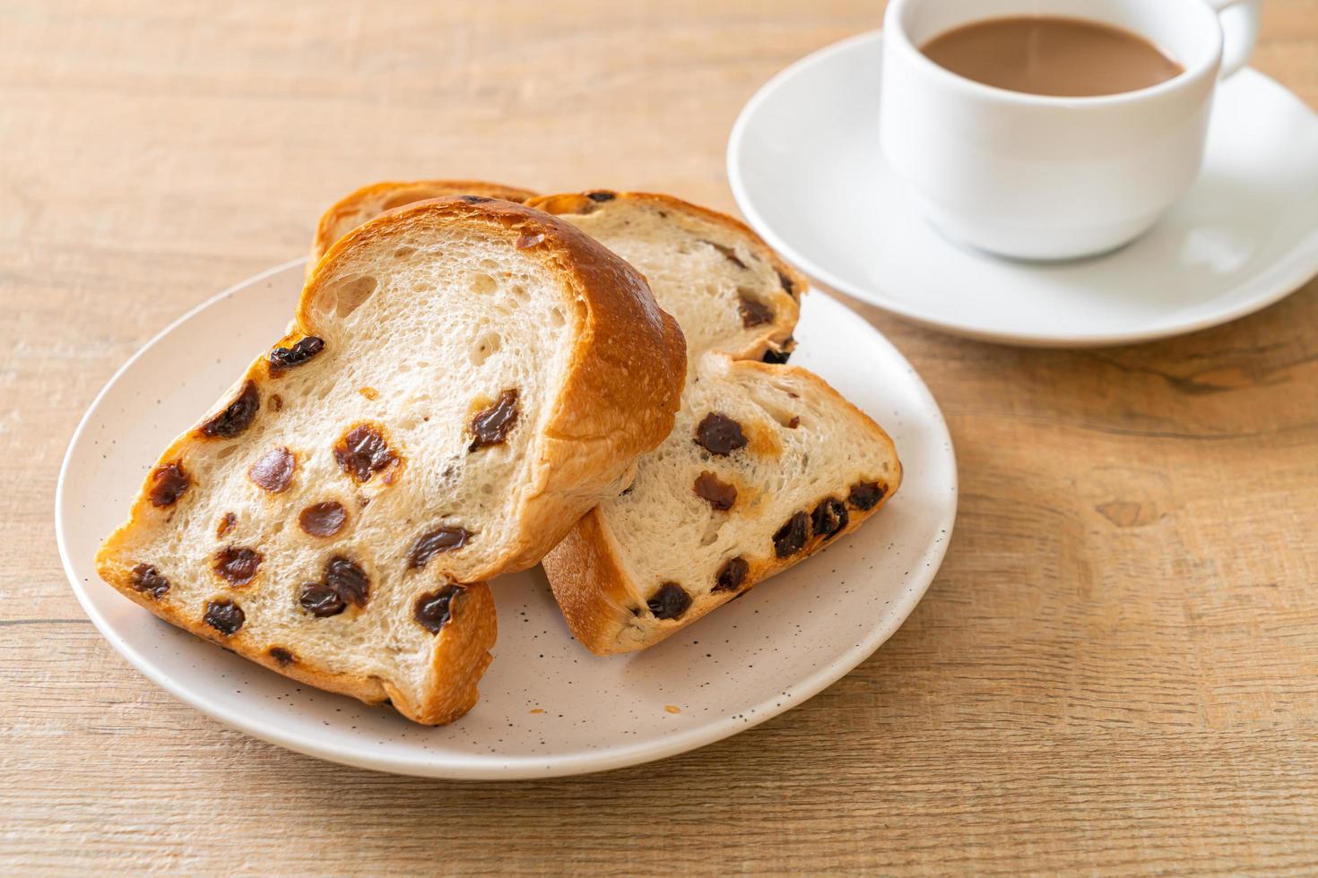 Raisin bread with coffee cup for breakfast photo