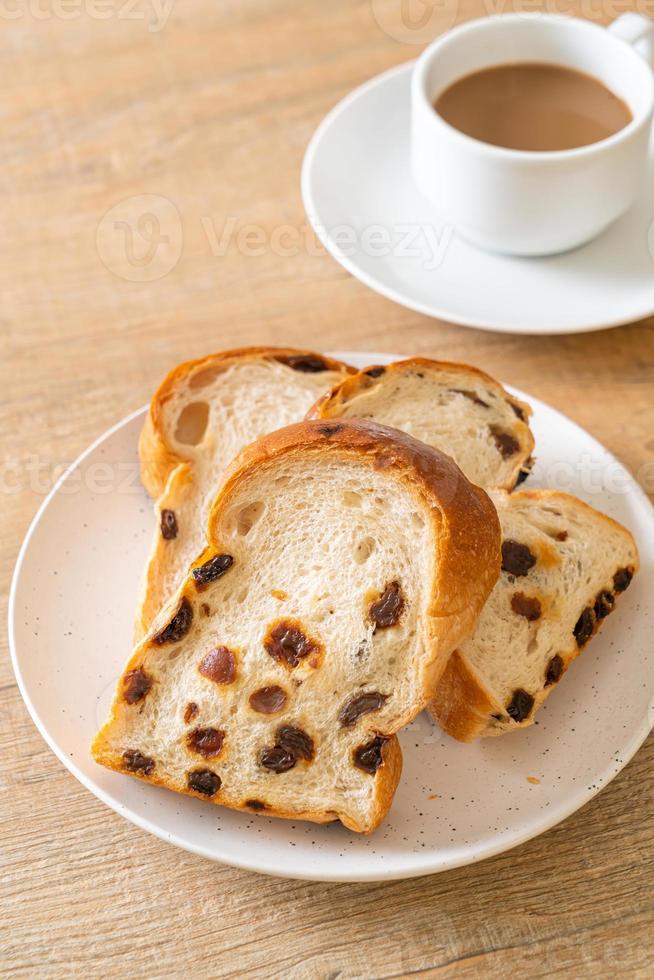 Raisin bread with coffee cup for breakfast photo