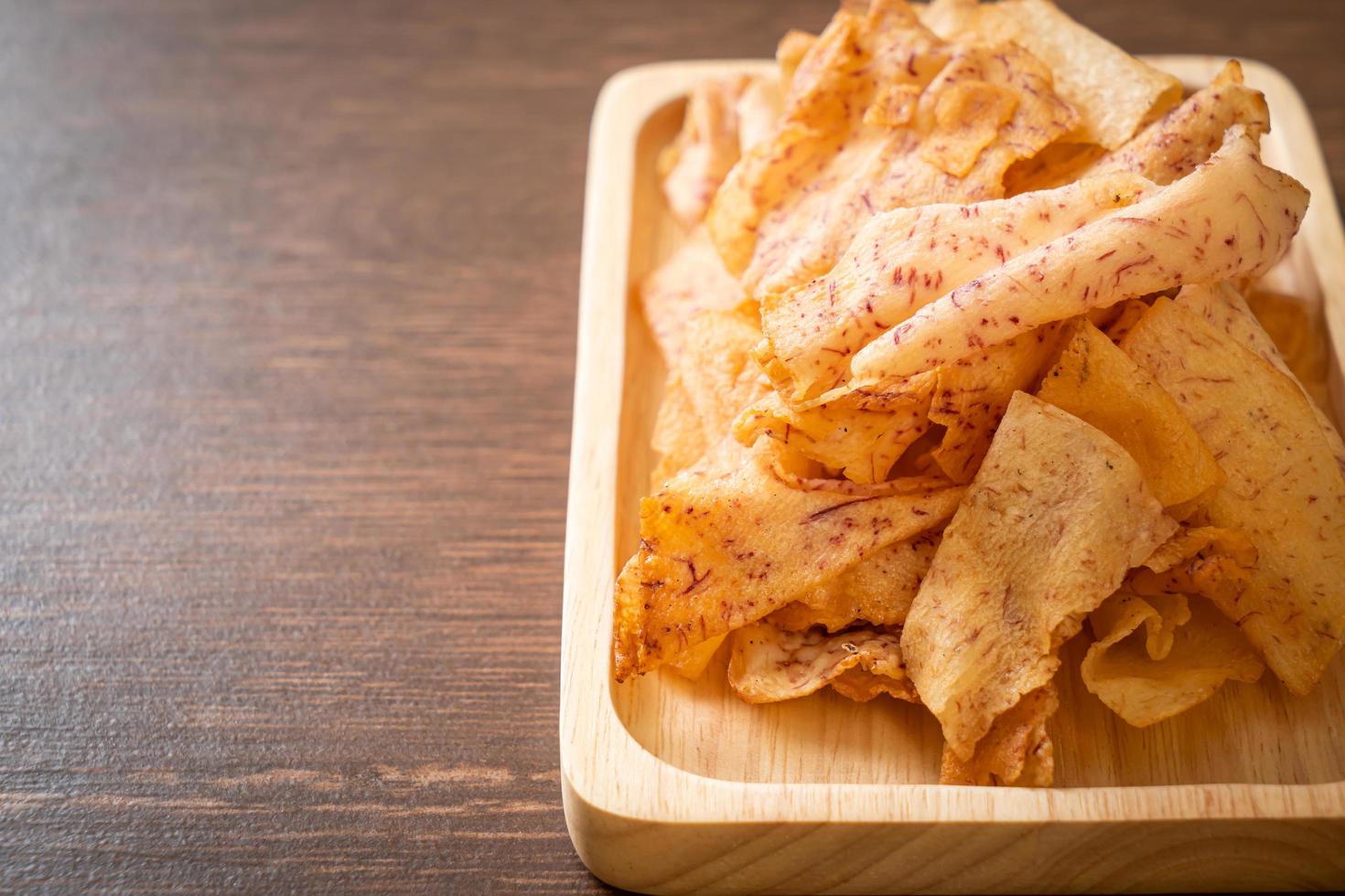 Taro Chips - fried or baked sliced taro photo