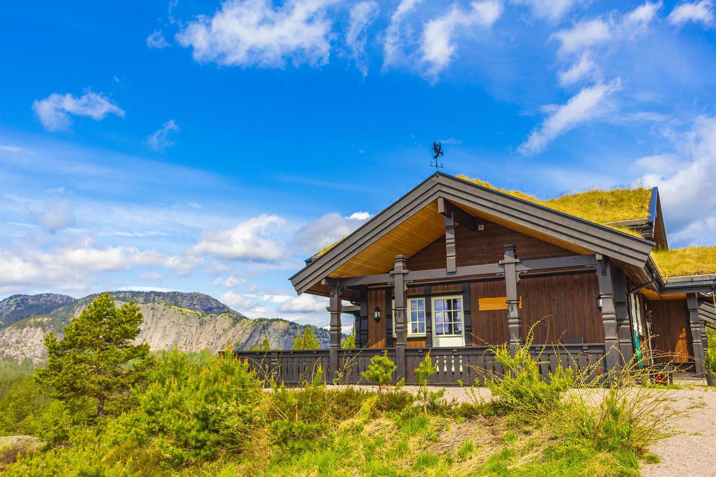 Norwegian wooden cabins cottages in the nature landscape Nissedal Norway. photo