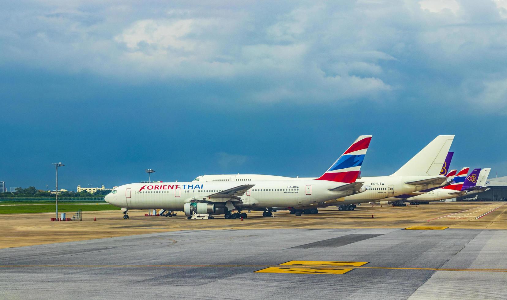 Orient Thai plane during storm at Bangkok Suvarnabhumi Airport, Thailand photo