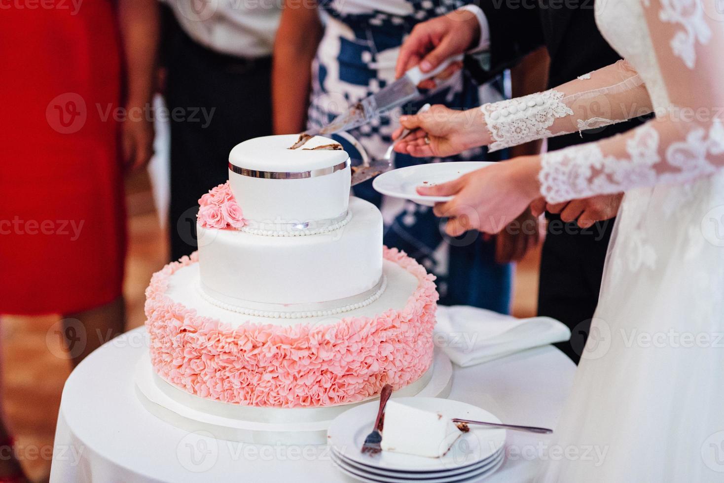 wedding cake at the wedding of the newlyweds photo