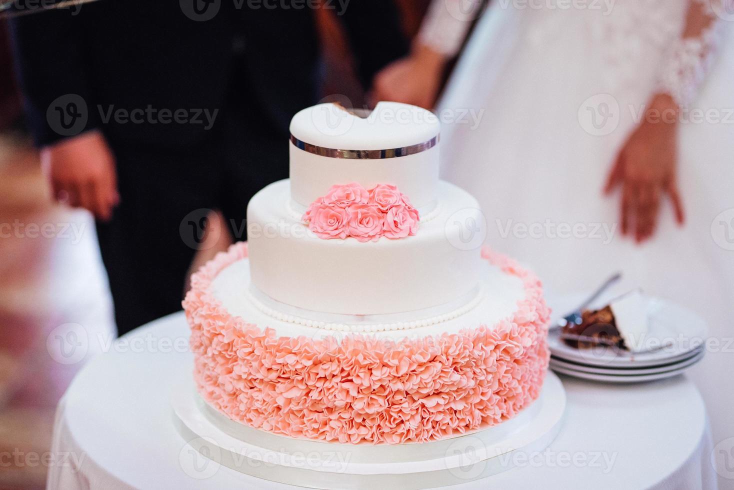 wedding cake at the wedding of the newlyweds photo