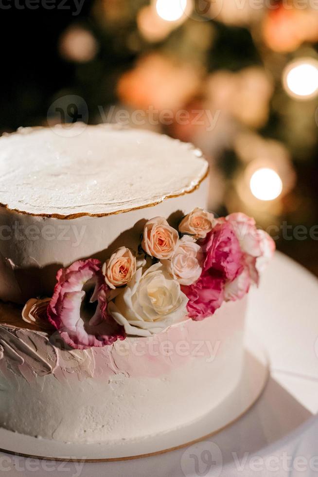 wedding cake at the wedding of the newlyweds photo