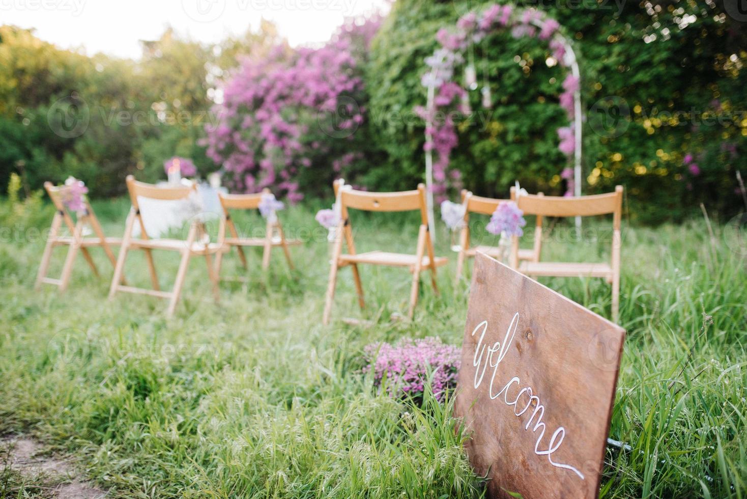 wedding ceremony in the woods among the trees photo