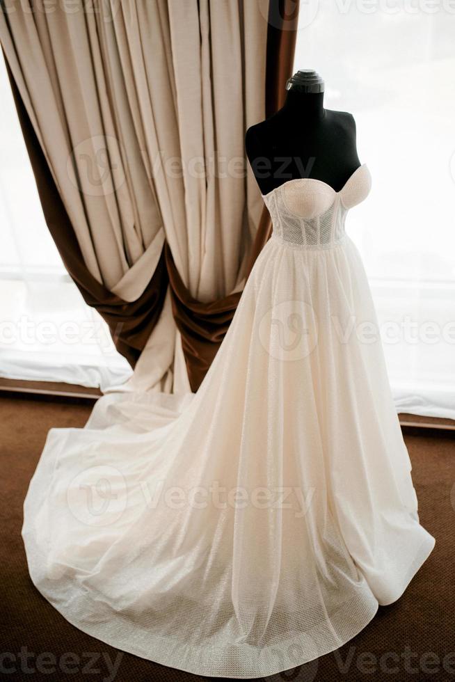 ivory wedding dress with a train photo