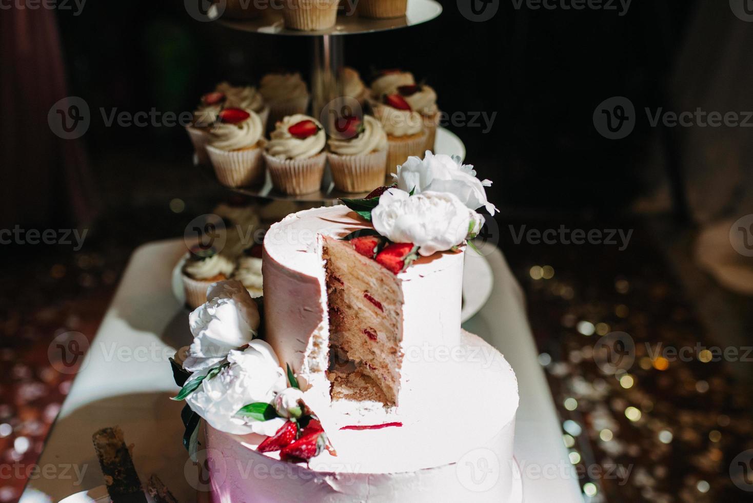 wedding cake at the wedding of the newlyweds photo