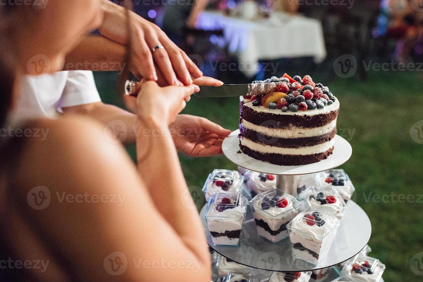 wedding cake at the wedding of the newlyweds photo