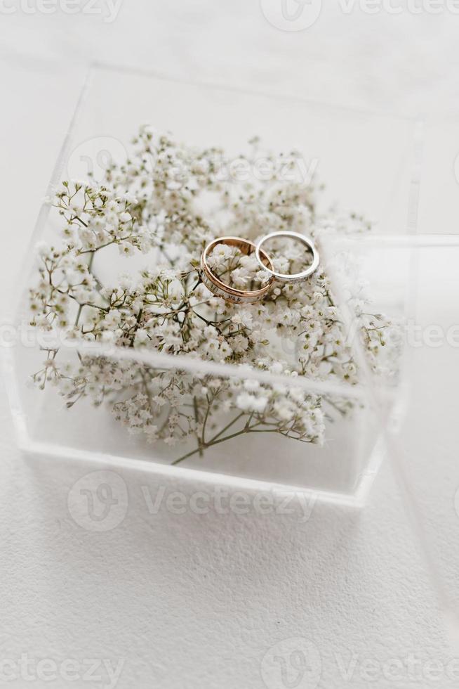 wedding rings with a gray wedding decoration photo