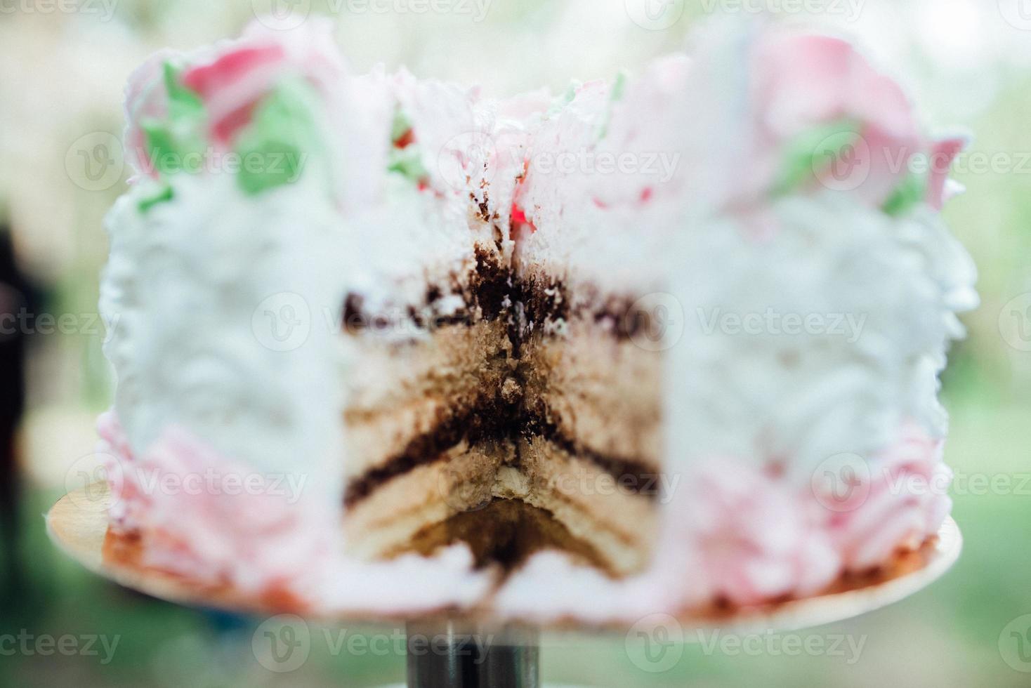 festive wedding sponge cake with white icing cream photo