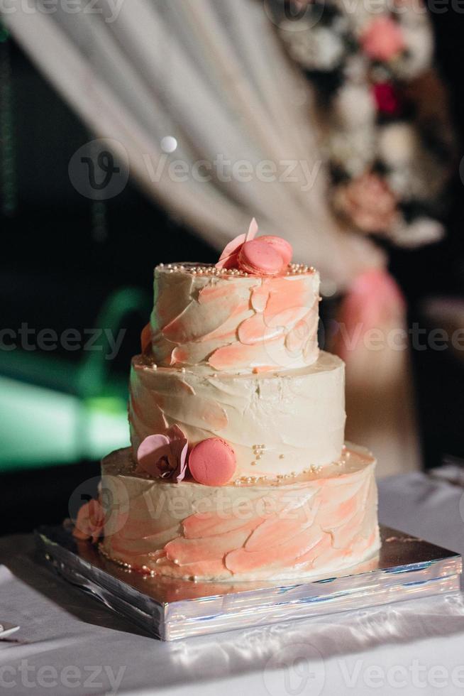 wedding cake at the wedding of the newlyweds photo