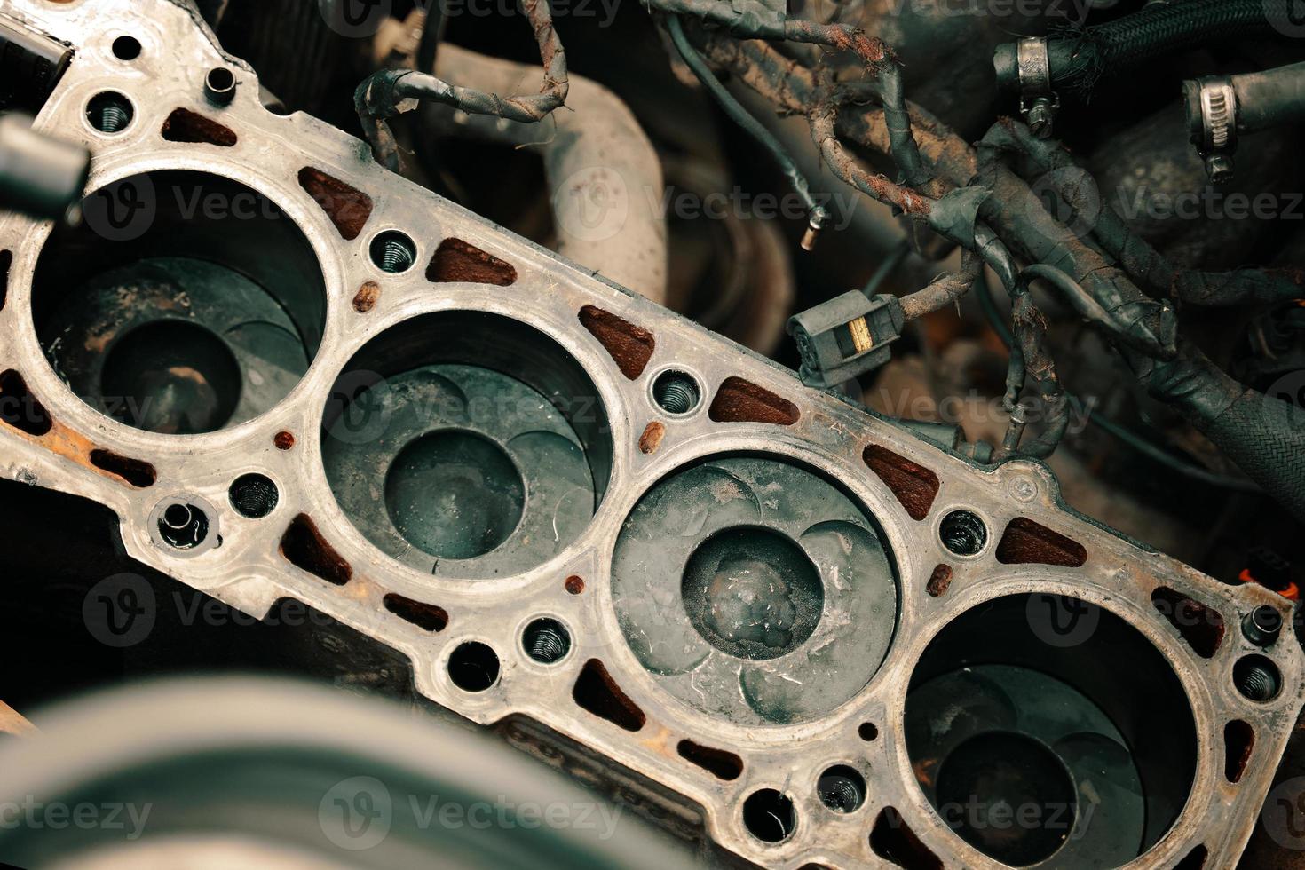 Pistons and cylinder head of engine block vehicle photo