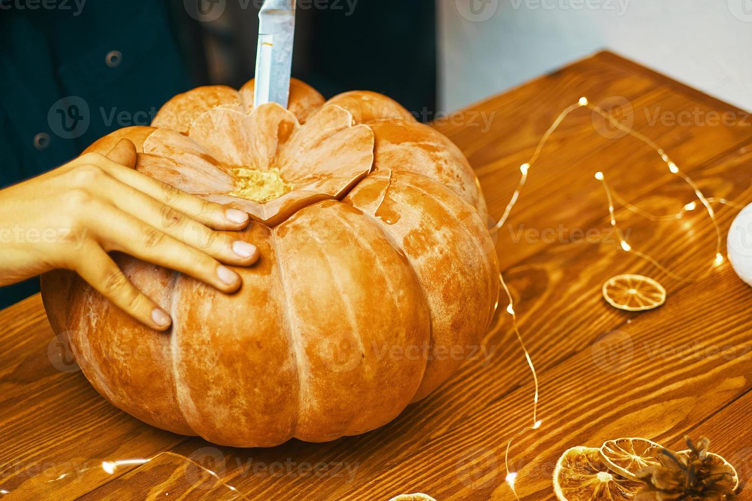 Halloween pumpkin preparing photo