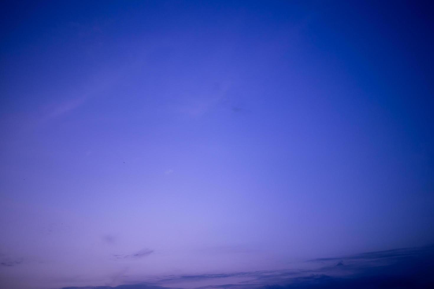 Colorful dramatic sky with cloud at sunset photo