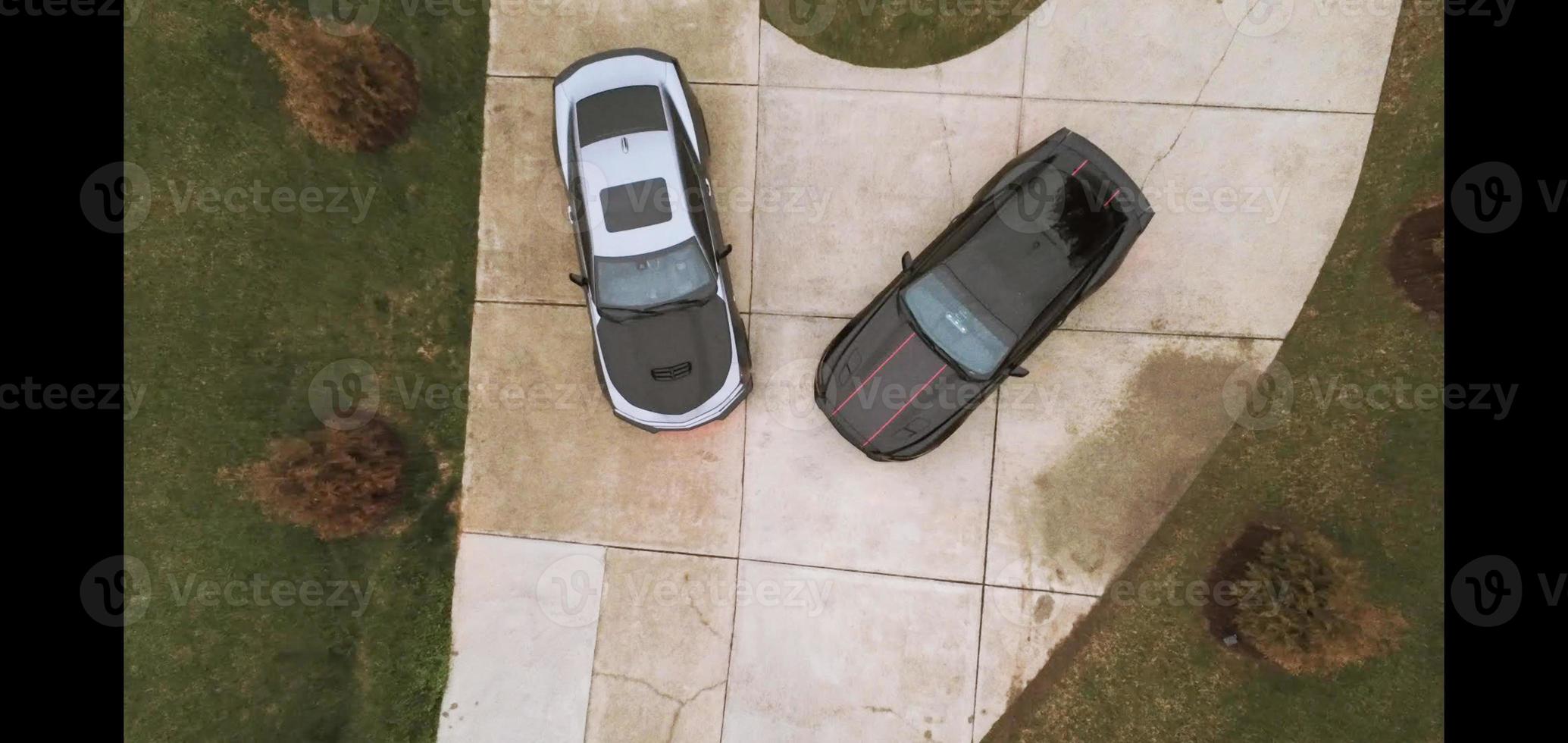 two cars parked in private driveway photo