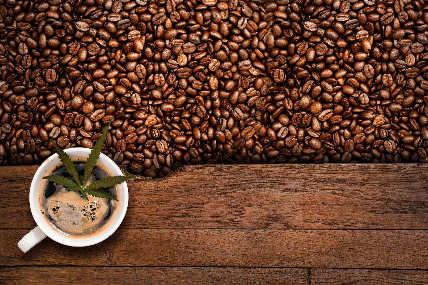 Cannabis coffee with coffee beans on table on the table photo