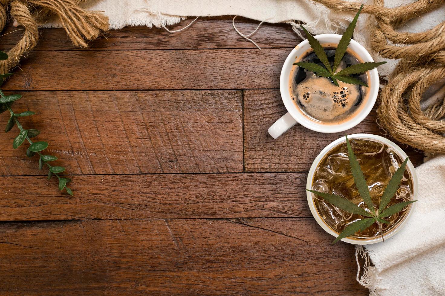 Cannabis coffee with coffee beans on table on the table photo