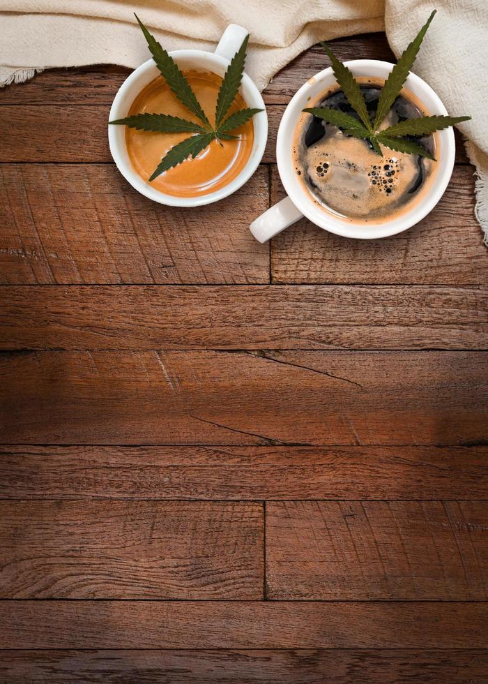 Cannabis coffee with coffee beans on table on the table photo