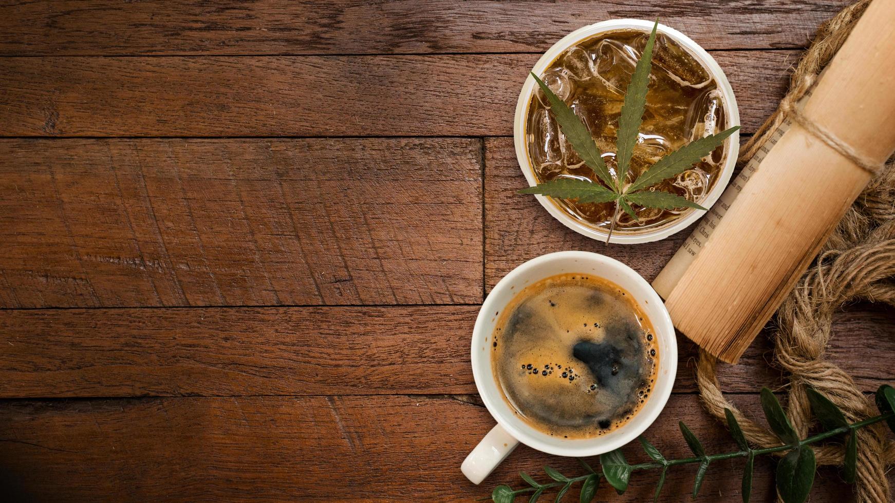 Cannabis coffee with coffee beans on table on the table photo