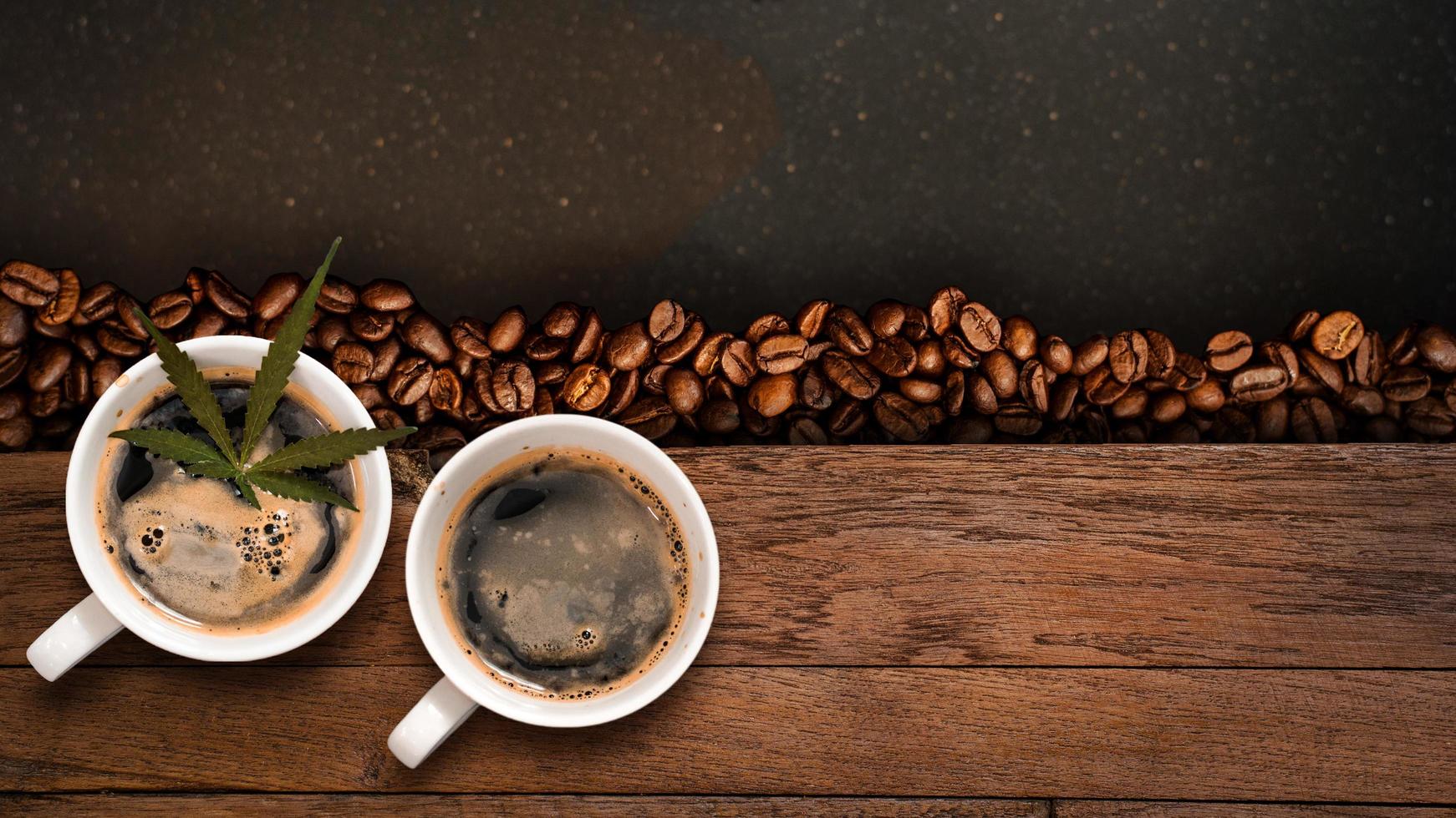 Cannabis coffee with coffee beans on table on the table photo