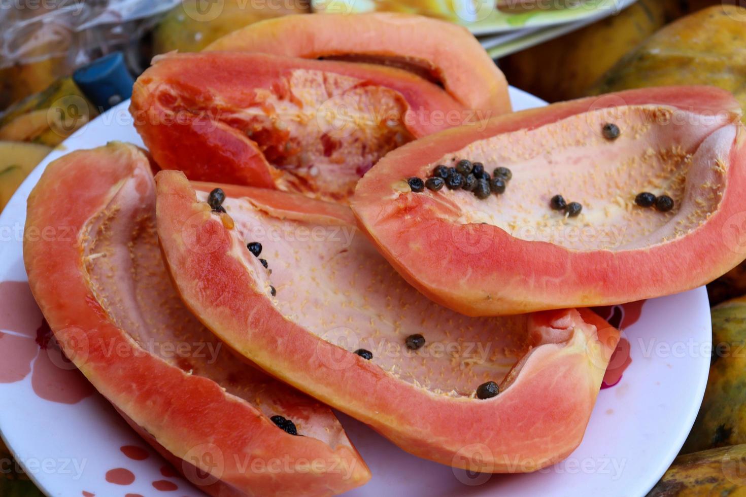 colorful papaya cut peace stock photo