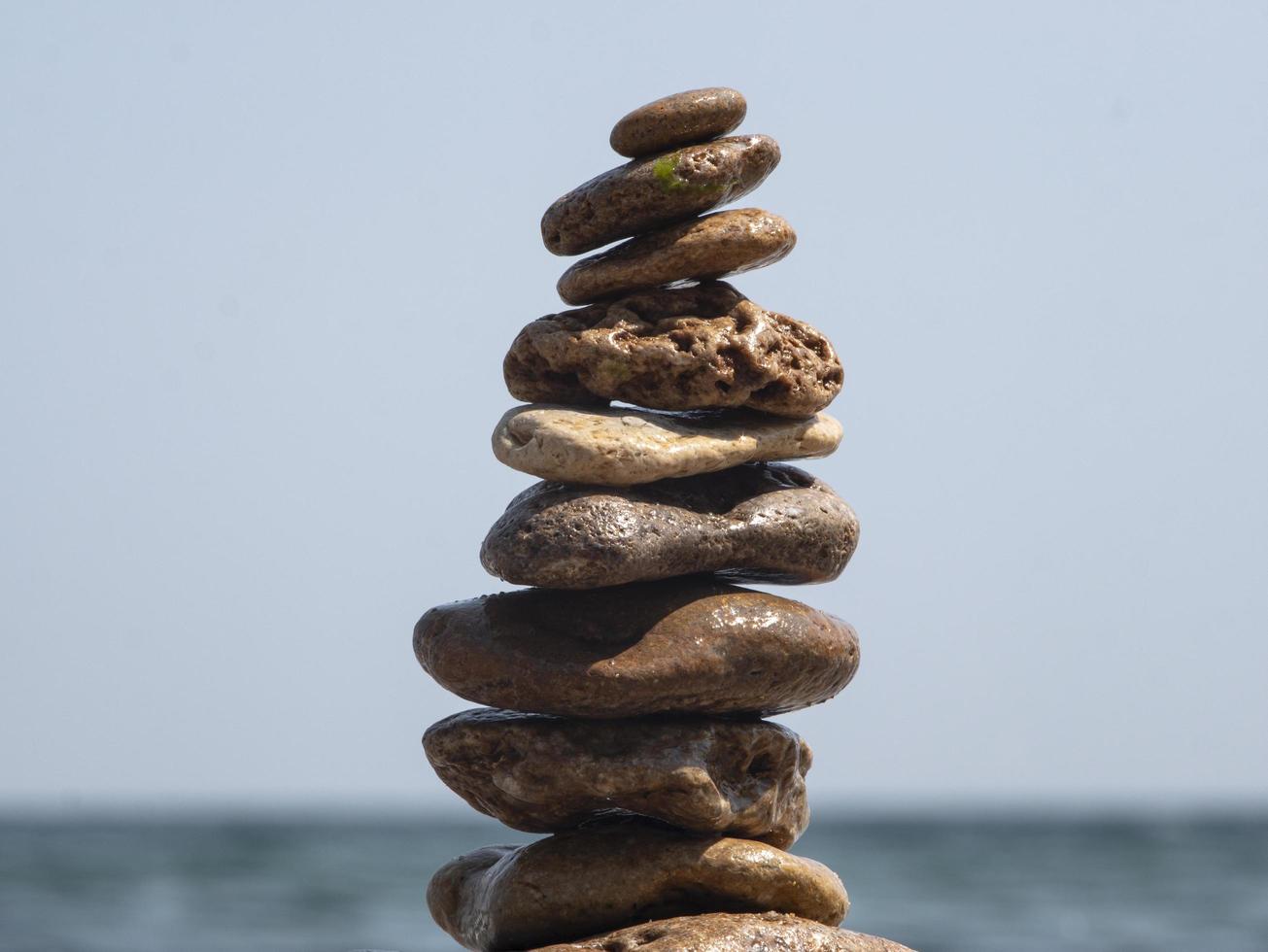 sea stones stacked on top of each other photo