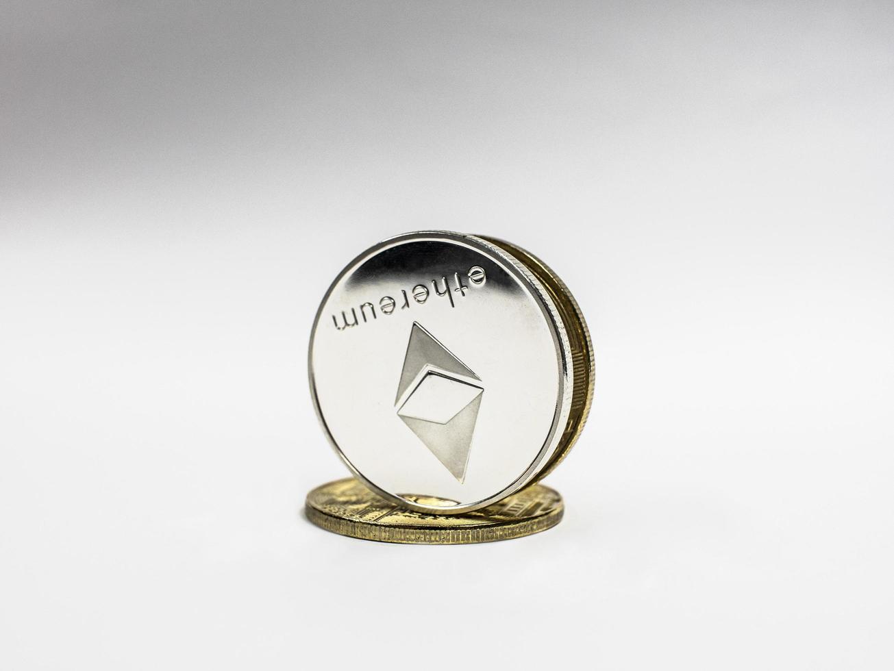 Silver ethereum coin. Crypto currency blockchain coin ethereum symbol on light background. ETHEREUM  cryptocurrency photo