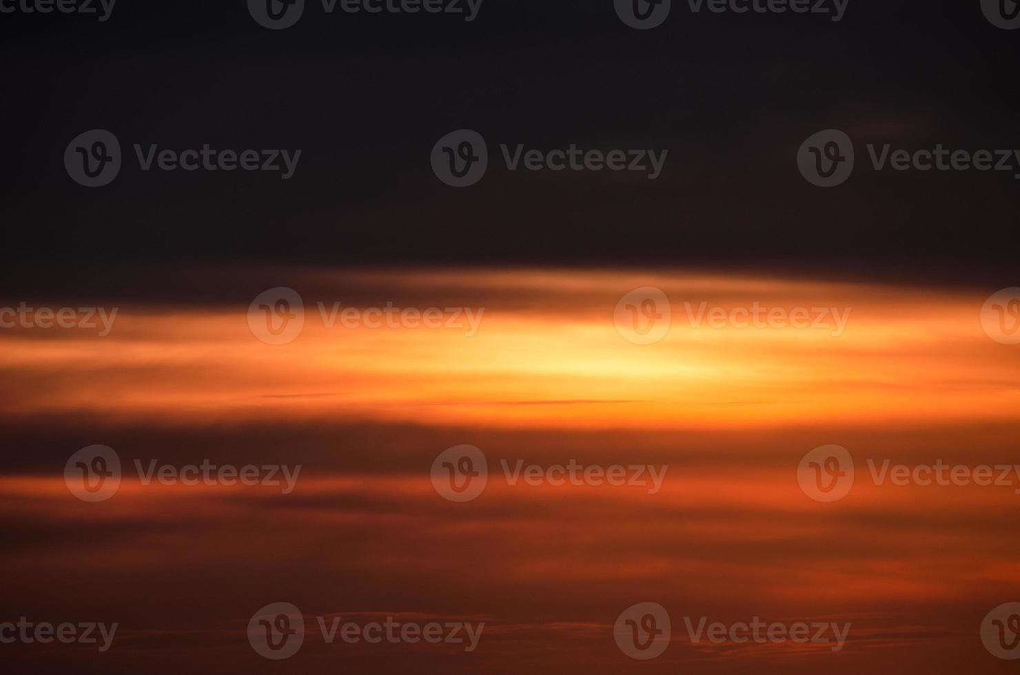 Beautiful, colorful and unusual sunset in a windy summer day photo