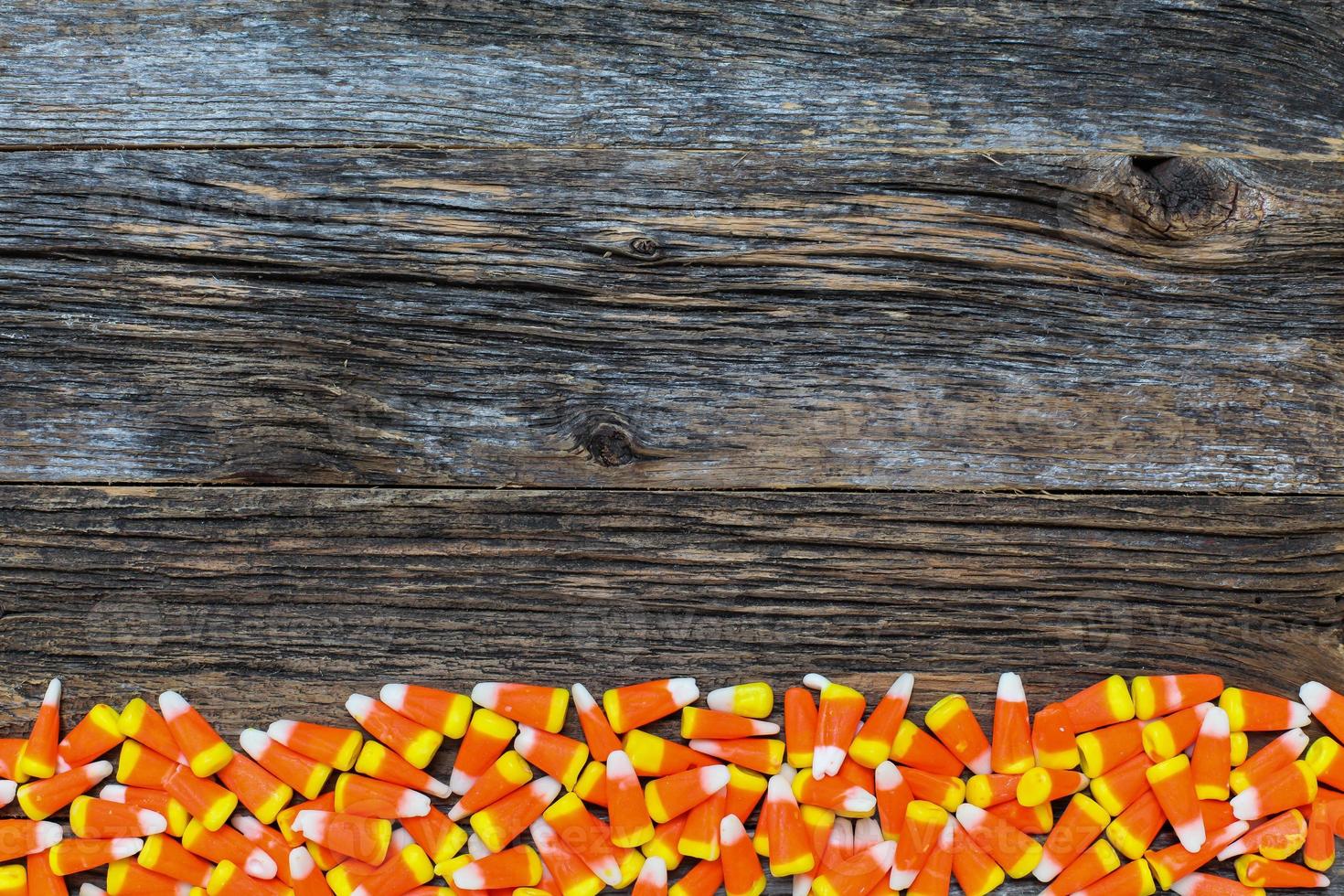 Corn candy on wooden rustic looking wooden background photo