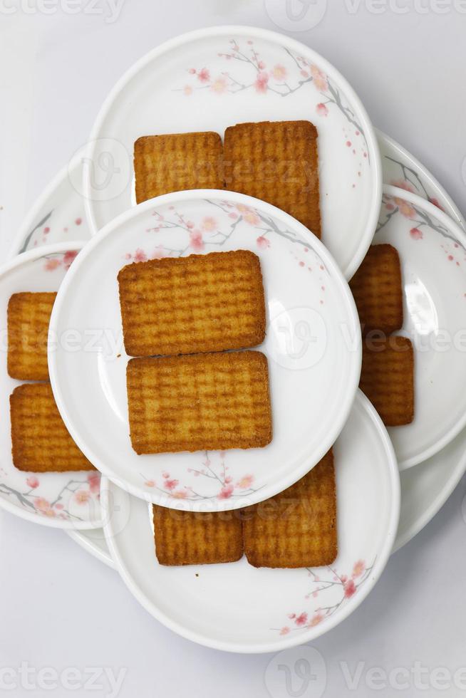 brown colored biscuit stock on bowl photo