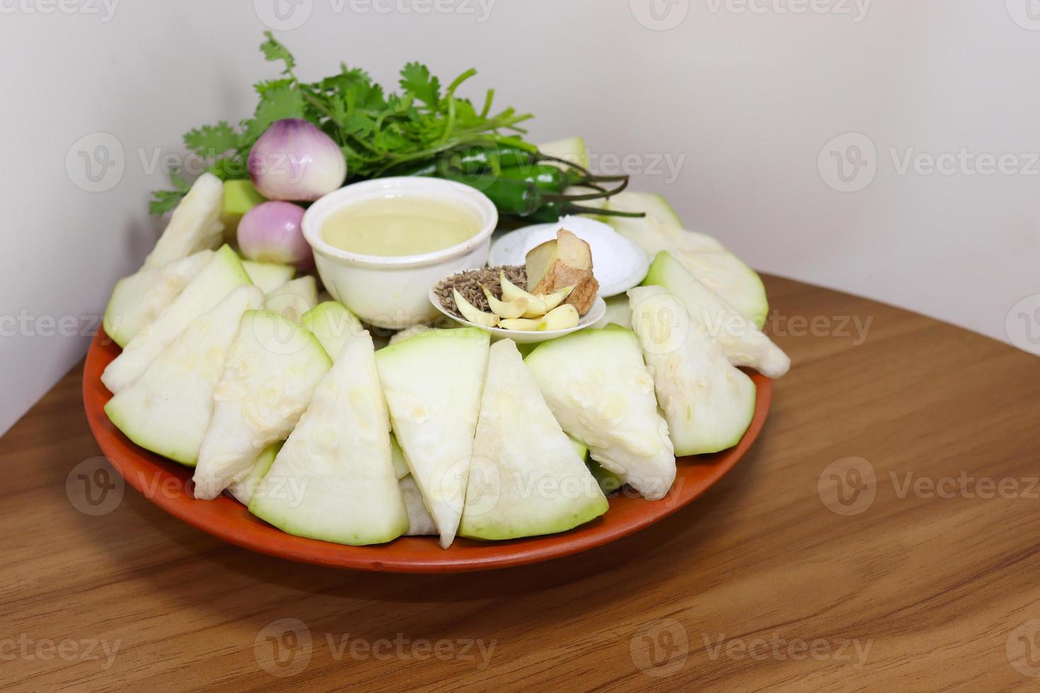 bottle guard slice stock on plate photo