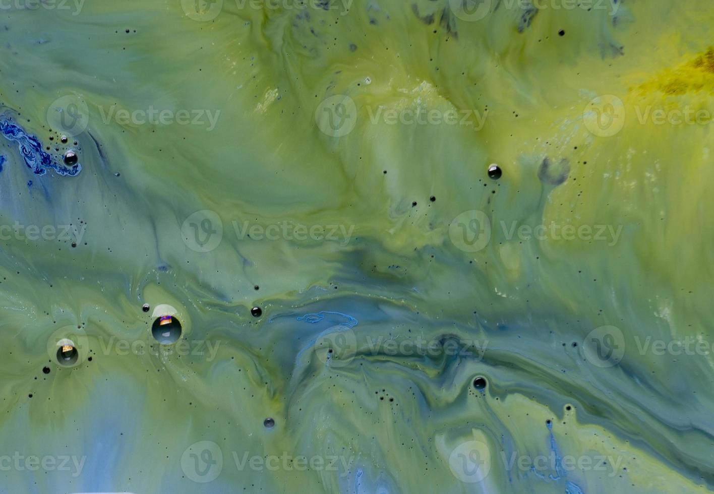 The colors of the aqueous ink are translucent. Abstract multicolored marble texture background photo