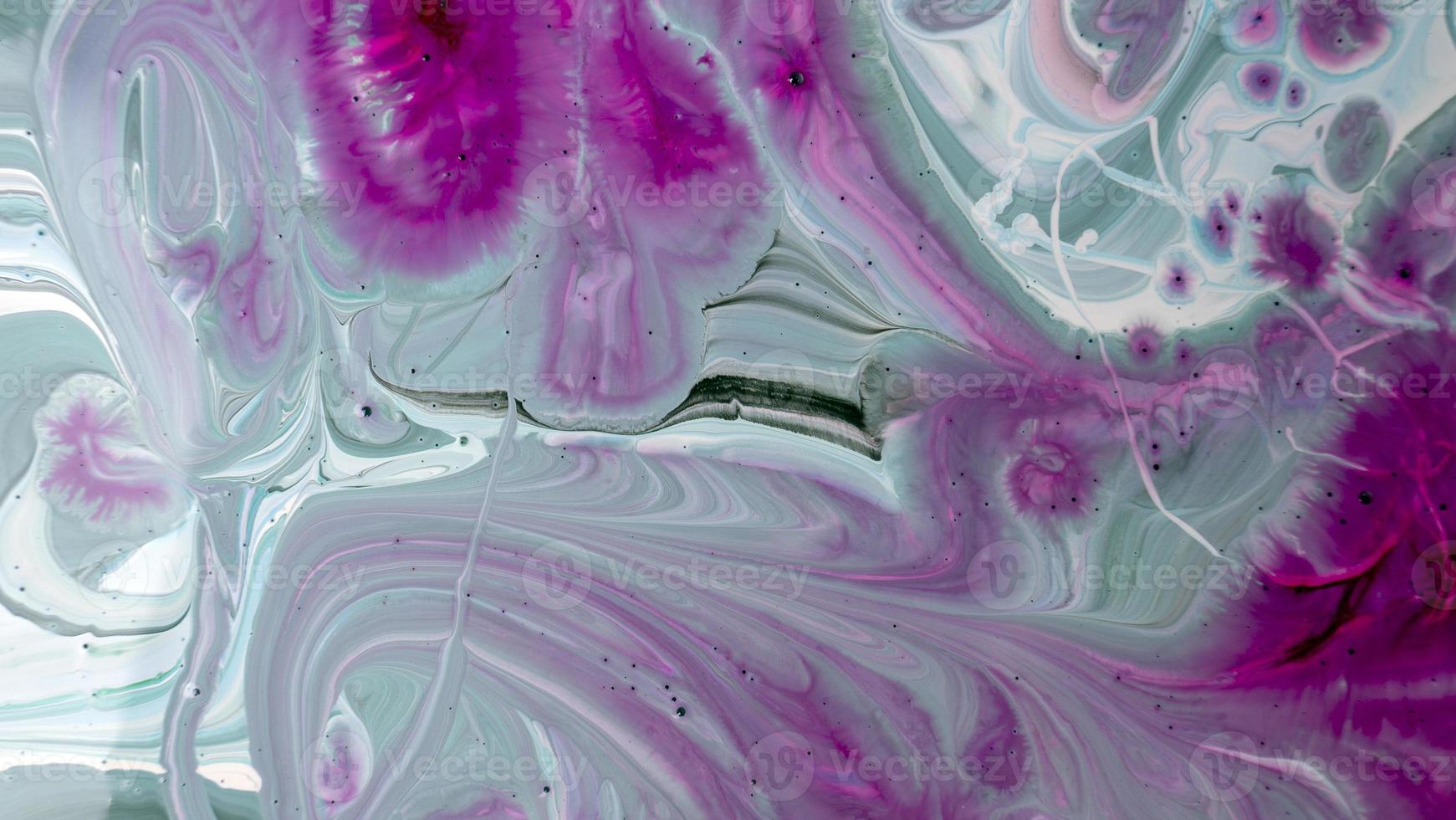 The colors of the aqueous ink are translucent. Abstract multicolored marble texture background photo