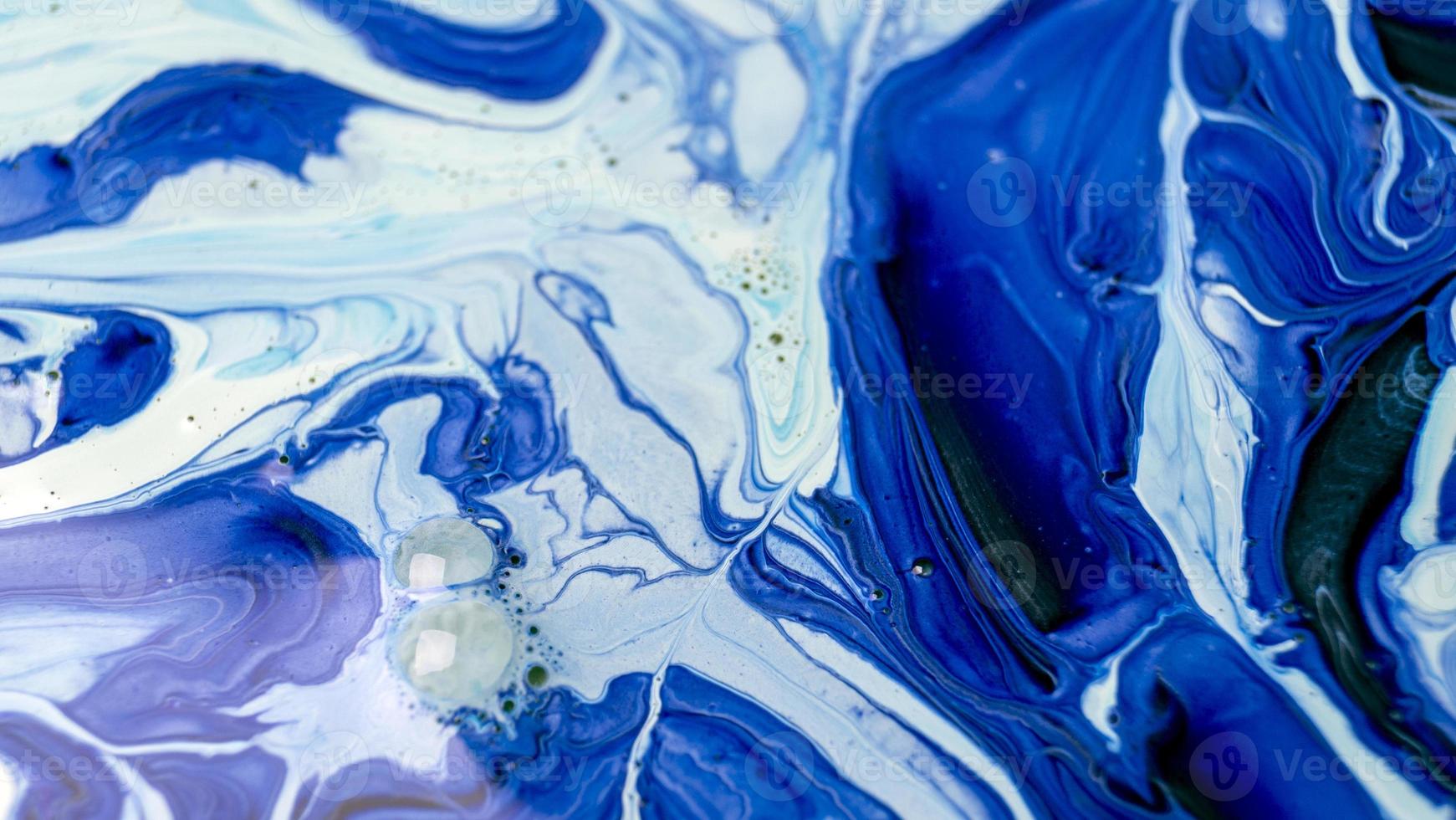 The colors of the aqueous ink are translucent. Abstract multicolored marble texture background photo