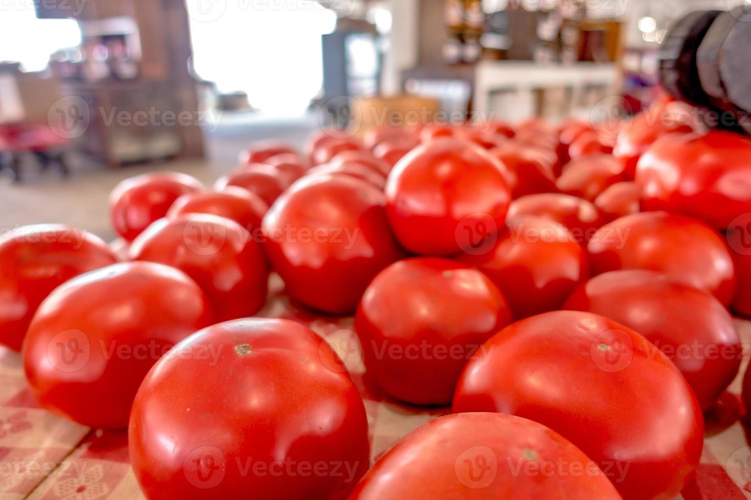 Tasty tomatoes on display at the farm market photo