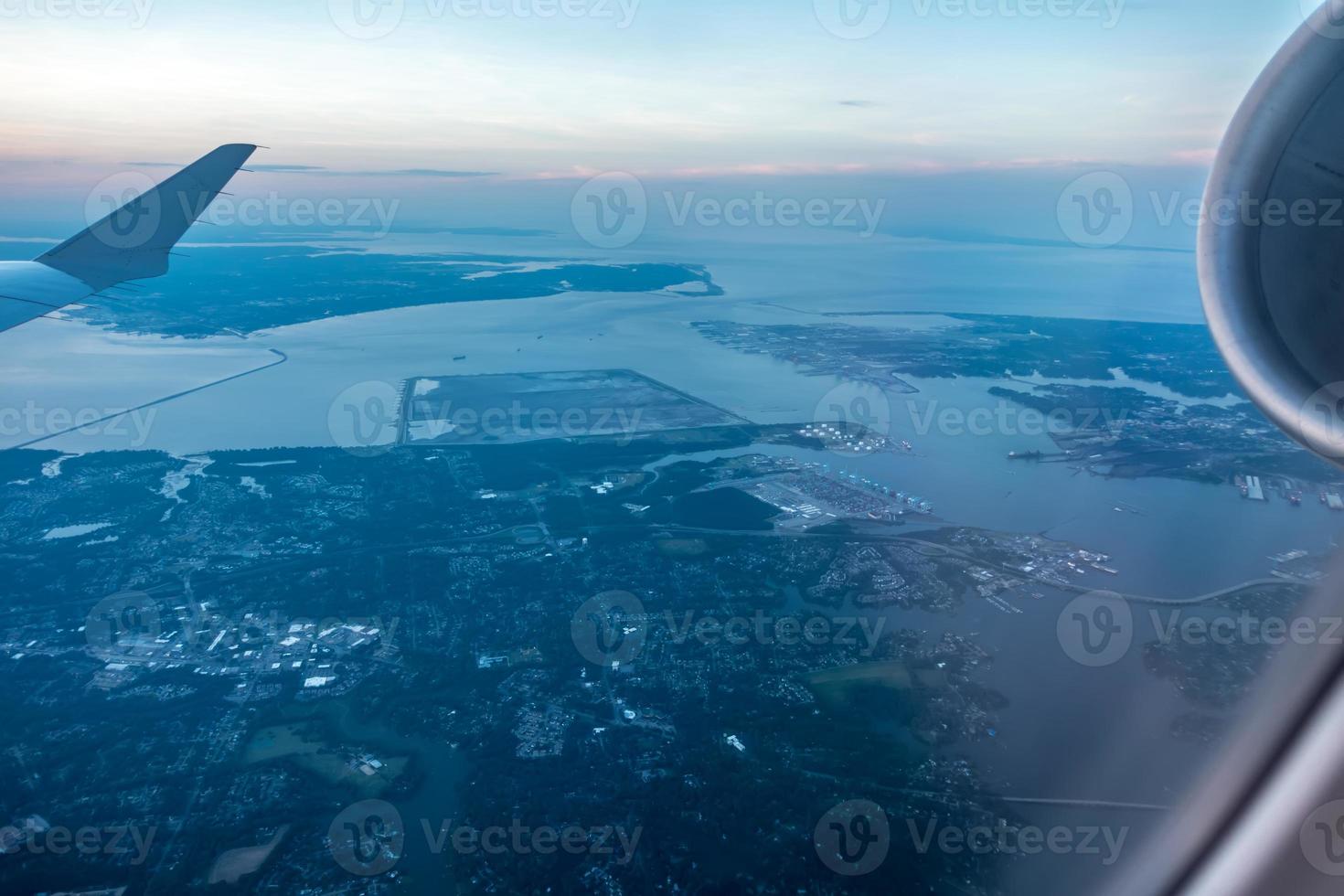 Sunset view from airplane window photo