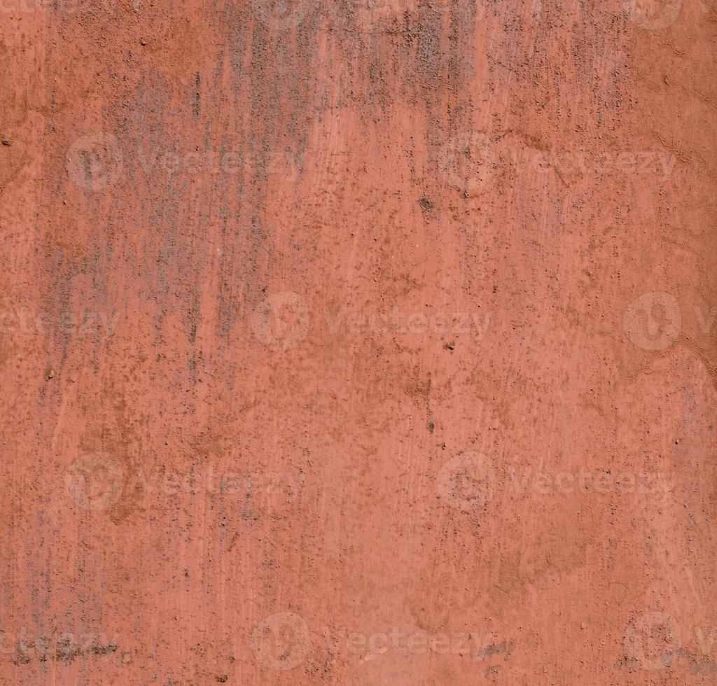 Textura de superficie de metal viejo pintado, pintura naranja con óxido foto