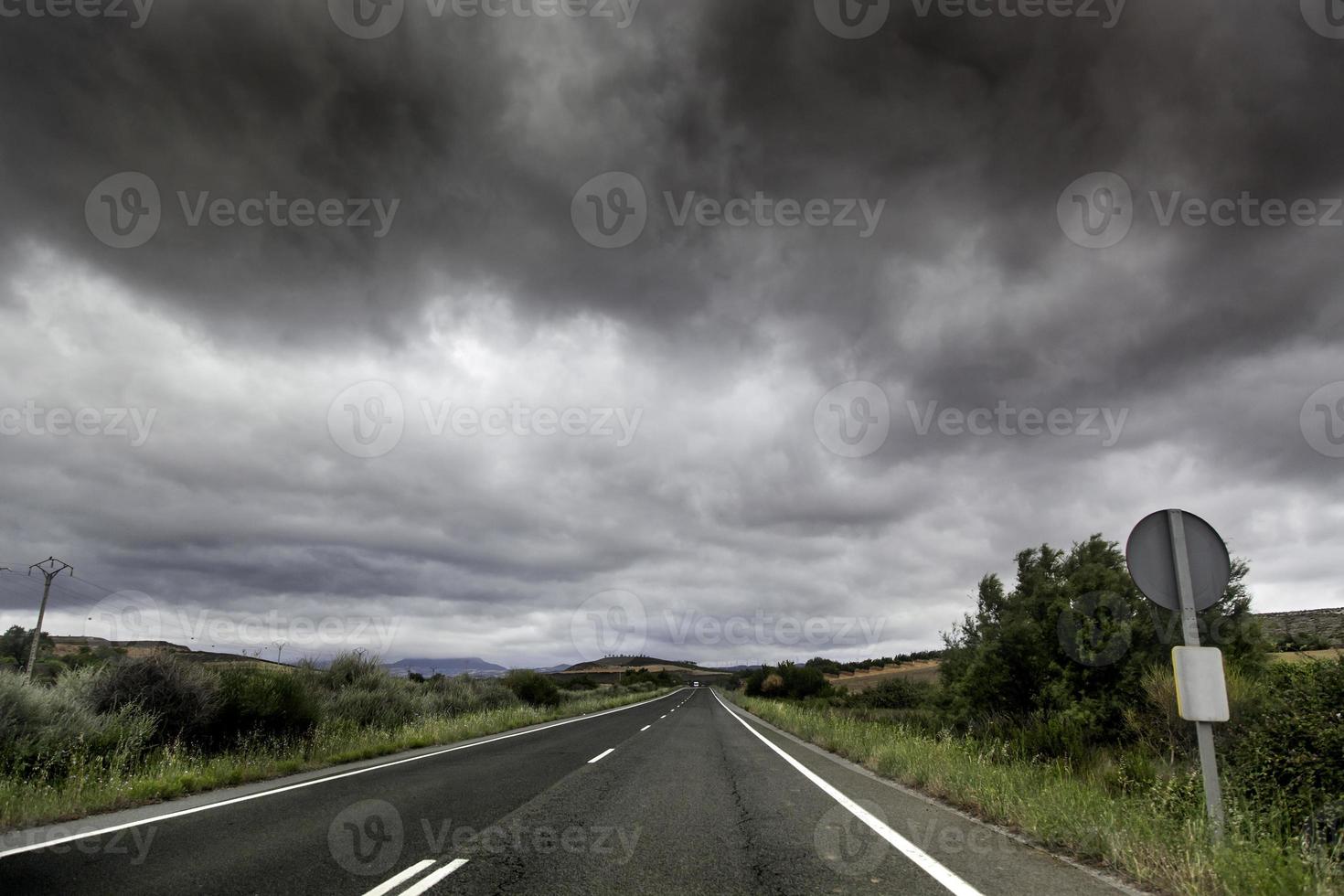Mountain road on a stormy day photo