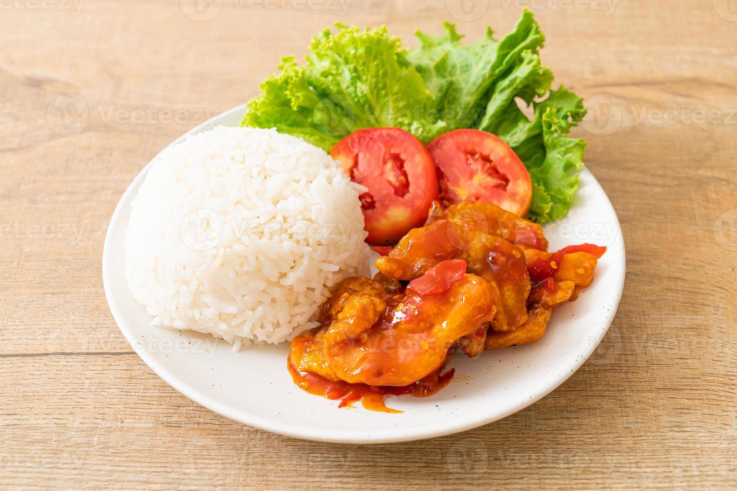 Fried fish topped by 3 flavors chili sauce with rice photo