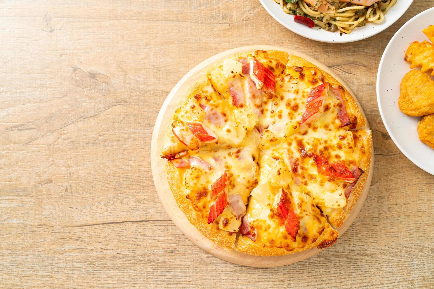 Ham and crab stick pizza or Hawaiian pizza photo